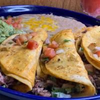 Tacos Al Carbon · Choice of tender beef skirt steak or marinated chicken breast, flame-broiled, sliced and fol...