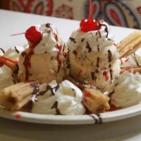 Deep Fried Ice Cream · А scoop of ice cream frozen hard, then rolled in cereal crumbs and zapped in the deep-fryer....