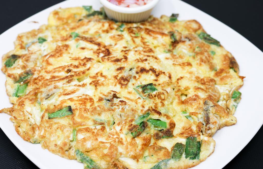 Baby Oyster Omelet · Gluten-free. Pan fried baby oyster omelet with homemade chili sauce .