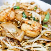 Char Kuey Teow (Ckt) · Stir fried flat rice noodle with shrimp, egg, chives and bean sprout.