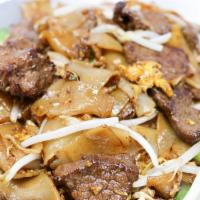 Beef Chow Fun · Stir fried flat rice noodle with beef, bean sprout, and U-choy.