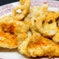 Flounder Fillet · Spicy crispy flounder fillet coated in light batter with sweet Kashmiri chili and turmeric s...