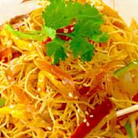 Singapore Rice Noodle · Cabbage, green and red peppers, onion, bean sprouts and rice noodle infused with curry powde...