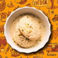 Rasmalai · Two pieces. Delicious Indian dessert made out of milk