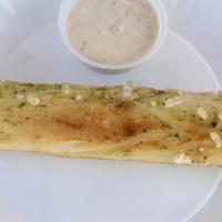 Babylonian Bread Stick · 1 large bread stick baked with vegan pesto, mozzarella cheese, or dairy-free shreds. Choice ...
