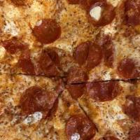 Pepperoni · Herbed marinara, topped with mozzarella, and pepperoni.