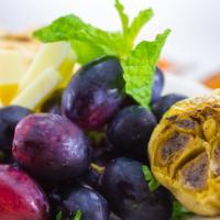 Izmir Cheese Platter · Mediterranean cheeses, fruit and fried pita