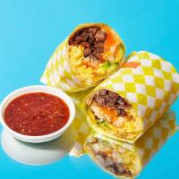 Ultimate Breakfast Burrito · Eggs, carne asada, bacon, tater tots, melted cheese, caramelized onions, avocado.