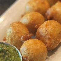 Goat Cheese Balls · Fried goat cheese with chimichurri sauce