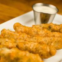 Fried Pickle Spears · Amber ale battered dill pickles with ranch sauce