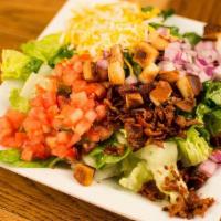 Side Salad · Romaine, cheese blend, applewood smoked bacon, red onion, tomato, croutons