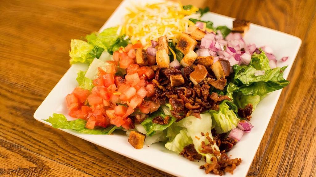 Side Salad · Romaine, cheese blend, applewood smoked bacon, red onion, tomato, croutons