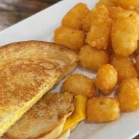 Kids Grilled Cheese · Texas toast & American cheese grilled golden brown