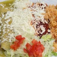 Wawa  Enchiladas Plate · 1 beef ranchera, 1 chicken green, and 1 queso fresco covered with guajillo sauce. Served wit...