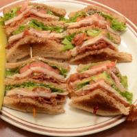 Club Supreme Sandwich · Delicious turkey, ham and bacon, lettuce and mayo.