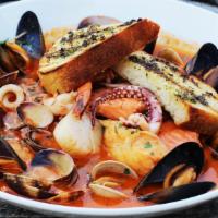 Seafood Cioppino	 · Salmon, rockfish, manila clams, mussels, prawns, calamari, and grilled sourdough.