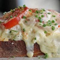 Open-Faced Crab Melt	 · Sourdough, vine-ripened tomatoes,  white cheddar marnay,  and choice of beer-battered fries ...