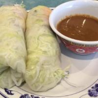 Summer Roll · Beef, shrimp, lettuce wrapped in rice paper. Served with peanut sauce.