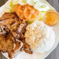 Grilled Pork Chop · Served with steamed rice.
