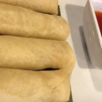 Veggie Spring Rolls (4) · Crispy fried veggie rolls, served with Thai sweet and sour sauce.