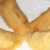 Crispy Spring Rolls (2) · Rice wrapper stuffed with minced chicken, taro, carrot, celery and cellophane noodle fried a...