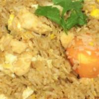 Thai Fried Rice · The famous Thai style fried rice with egg, onion, tomato and scallion.