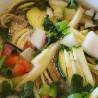 Zucchini Pho (Gf) · Gluten free. Fresh zucchini noodle, red bell pepper, onion, cilantro, green onion and home m...