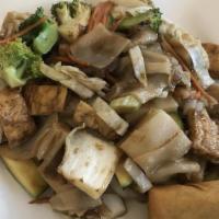 Deluxe Flat Noodle · Stir fried with tofu, mushroom, soy protein, mix vegetable, cilantro.