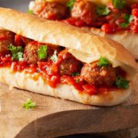 Italian Meatball Wrap · Our chef's special parmesan & herb seasoned meatballs, served on a delicious flatbread. Deco...