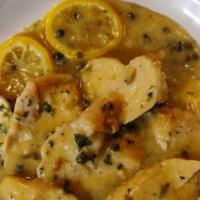 Chicken Piccata · Sauteed chicken in a lemon butter sauce with capers served over pasta of choice. Comes with ...