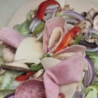 Antipasto Salad · Lettuce, ham, salami, mushrooms, tomatoes, red onions, green peppers, black olives, and Prov...