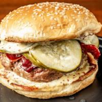 Barnato Burger · Duck & Wagyu Beef Blend Burger, Duck Bacon, Stone Ground Dijon Aioli, Pickles, Sesame Brioch...