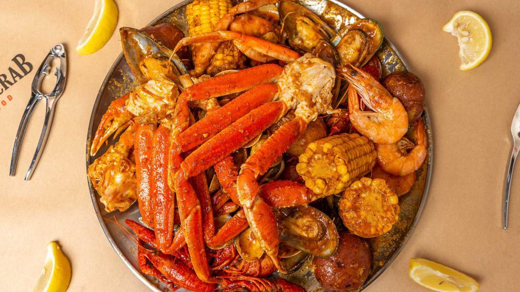 Small Seafood Platter · Snow crab (2 clusters), whole shrimp (1/2 lb), crawfish (1/2 lb), mussels (1/2 lb), clams (1/2 lb), two corns and three potatoes, (not sold by the pound, cannot be substituted).
