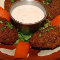 Falafel · Vegetable patties made with ground chickpeas parsley, onion, garlic, mixed with special herb...