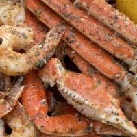 Snow Crab & Shrimp · Seafood. 1 lb of snow crab legs paired with 7 jumbo shrimp marinated in our signature house ...