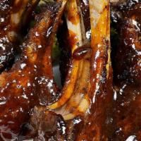 Bbq Bourbon Lamb · Bourbon BBQ lamb chops served with garlic mash and grilled asparagus or your choice of 2 sig...