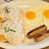 2 Biscuits & Gravy Combo · Served with two eggs and your choice of ham, bacon or sausage.