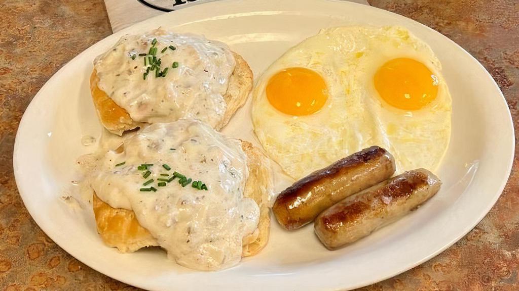 2 Biscuits & Gravy Combo · Served with two eggs and your choice of ham, bacon or sausage.