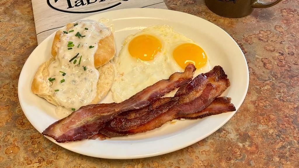 1 Biscuit & Gravy Combo · Served with two eggs and your choice of ham, bacon or sausage.