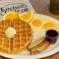 Belgian Waffle Combo · Crisp belgian waffle. Served with two eggs and your choice of ham, bacon or sausage.