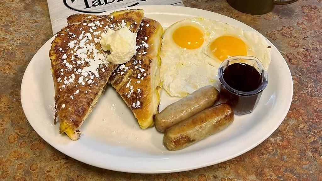 Cinnamon Roll French Toast Combo · Large fresh baked cinnamon roll dipped in egg batter, grilled to perfection. Served with two eggs and your choice of ham, bacon or sausage.