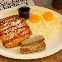 Lemon Raspberry French Toast Combo · Thick lemon bread dipped in egg batter and grilled to perfection. Dusted with powdered sugar...