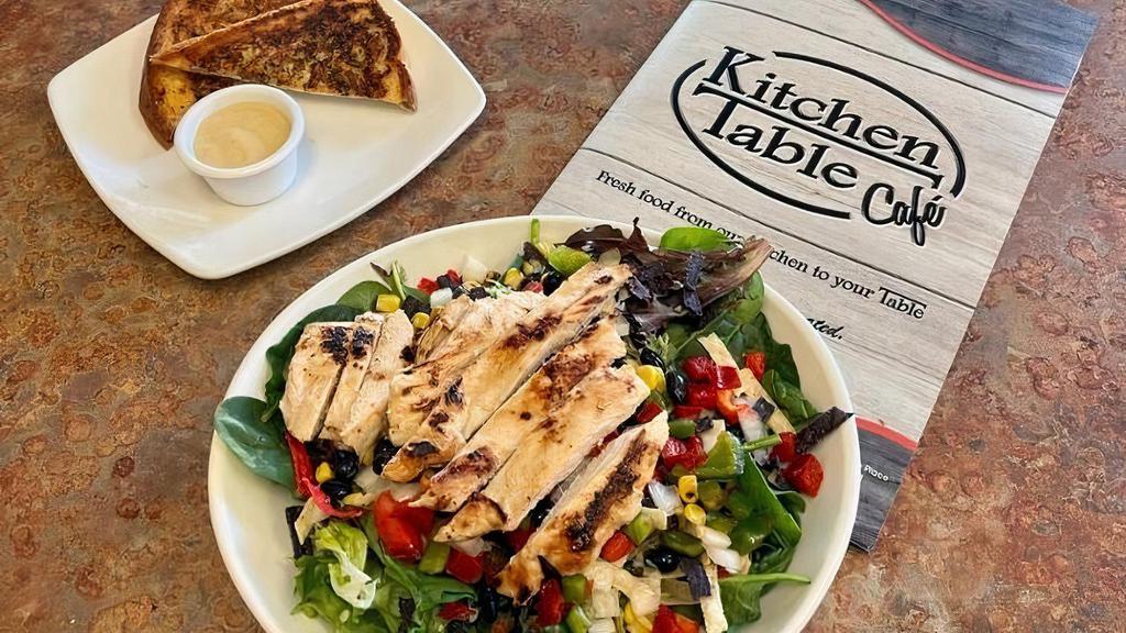 Fiesta Chicken Salad · Fresh greens, grilled chicken breast, black beans, corn, bell peppers, onions, tortilla strips and pepper jack cheese. Served with avocado ranch dressing.