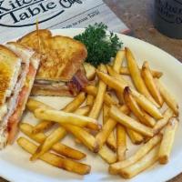 Grilled Turkey & Bacon · Grilled turkey, bacon, tomato and melted jack cheese on grilled sourdough bread.