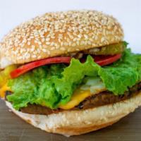 Black Bean Burger · Homemade vegetarian black bean burger. This burger comes with cheese, lettuce, tomatoes, oni...