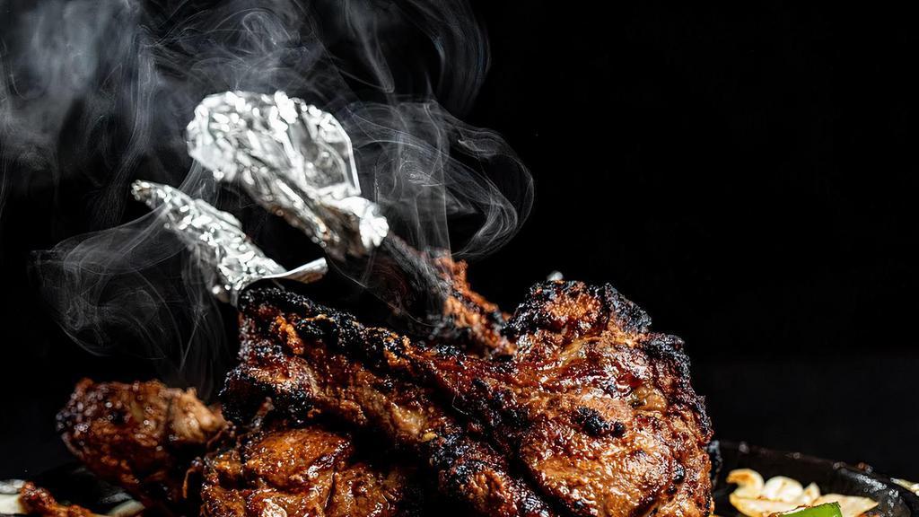Lamb Chops · 3 pcs lamb chops marinated in house blend spices cooked to perfection.