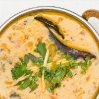 Tadka Dal · Yellow lentil sauteed with curry leaves and spices