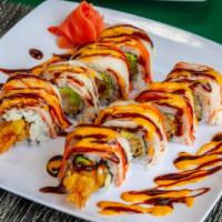 Emt Roll · Shrimp tempura ;avocado and cucumber . Topped with shredded crabmeat , spicy mayo and eel sa...