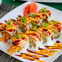 Red Bull Roll · Shrimp tempura and avocado. Topped with cook salmon, scallions , spicy mayo and eel sauce