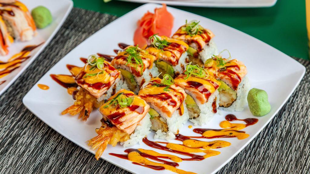 Red Bull Roll · Shrimp tempura and avocado. Topped with cook salmon, scallions , spicy mayo and eel sauce